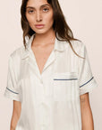Model is wearing Inez Washable Silk Jacquard Short PJ Set in ClassicStripeJacquardPea/Na