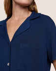 Model is wearing Gisele TENCEL™ Modal Rib Relaxed Short PJ Set in Navy