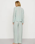 Model is wearing Nautico Long PJ Set in Regatta Stripe Seagrass/White