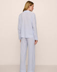Model is wearing Nautico Long PJ Set in White/CornflowerBlue