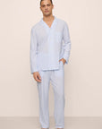 Model is wearing Men's Nautico Long PJ Set in White/CornflowerBlue