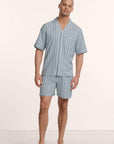 Model is wearing Men's Nautico Short PJ Set in Classic Stripe Slate Blue/Ivor