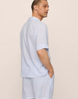 Model is wearing Men's Nautico Short PJ Set in White/CornflowerBlue