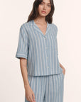 Model is wearing Nautico Relaxed Short Sleeve & Pant PJ Set in Classic Stripe Slate Blue/Ivor