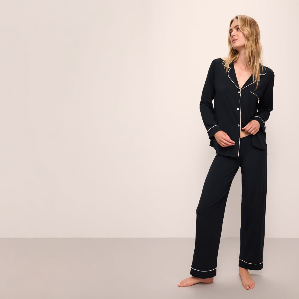 Model wearing Gisele TENCEL™ Modal Long PJ Set in Black/Sorbet Pink