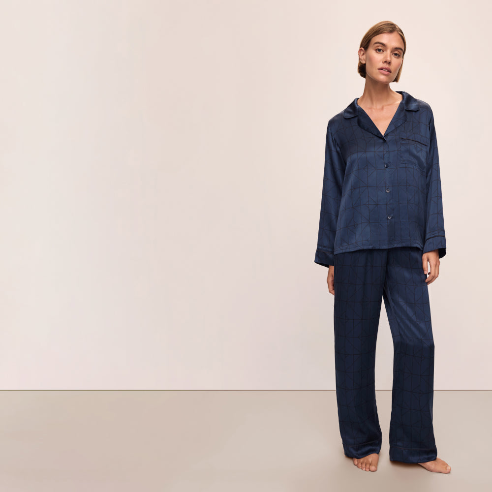 Model is wearing Inez Washable Silk Printed Long PJ Set in Mosaic Tile Navy/Black