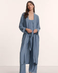 Model is wearing Gisele Printed TENCEL™ Modal Long Robe in Duo Stripe Slate Blue/Ivory