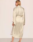 Model is wearing Inez Washable Silk Printed Robe in Foliage Mint Cream