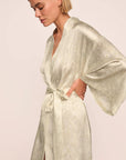 Model is wearing Inez Washable Silk Printed Robe in Foliage Mint Cream