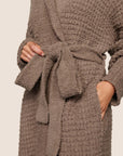 Model is wearing Recycled Boucle Robe in Deep Taupe