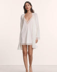 Model is wearing Lara TENCEL™ Modal Short Robe in Ivory