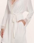 Model is wearing Lara TENCEL™ Modal Short Robe in Ivory