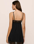 Model is wearing Beatrix TENCEL™ Modal Slip in Black