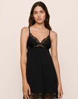 Model is wearing Beatrix TENCEL™ Modal Slip in Black