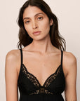 Model is wearing Beatrix TENCEL™ Modal Slip in Black