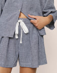 Model is wearing Linen Blend Relaxed Short in GinghamWhite/Navy