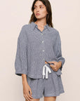 Model is wearing Linen Blend Relaxed Short in GinghamWhite/Navy