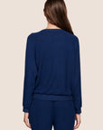 Model is wearing Cozy Time Crew Neck Pullover in Navy