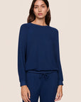 Model is wearing Cozy Time Crew Neck Pullover in Navy