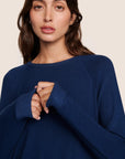 Model is wearing Cozy Time Crew Neck Pullover in Navy