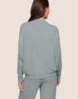 Model is wearing Cozy Time Mock Neck Pullover in Lead