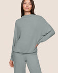 Model is wearing Cozy Time Mock Neck Pullover in Lead