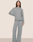 Model is wearing Cozy Time Mock Neck Pullover in Lead