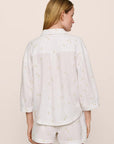 Model is wearing Linen Blend Relaxed Quarter Sleeve Top in SummerDaisyWhite/PeachDust