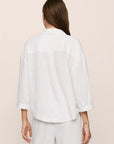 Model is wearing Linen Blend Relaxed Quarter Sleeve Top in White