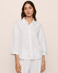 Model is wearing Linen Blend Relaxed Quarter Sleeve Top in White