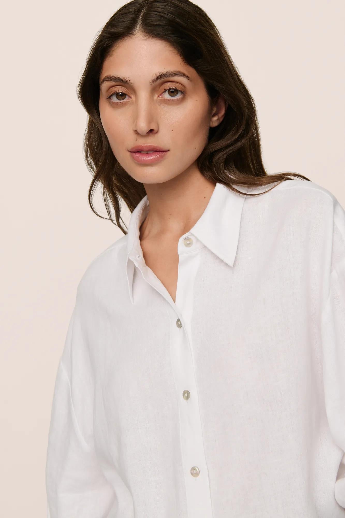 Model is wearing Linen Blend Relaxed Quarter Sleeve Top in White