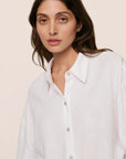 Model is wearing Linen Blend Relaxed Quarter Sleeve Top in White