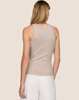 Model is wearing Essential Rib Tank in Beige