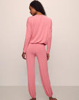 Model is wearing Gisele TENCEL™ Modal Slouchy PJ Set in  Sunkissed Coral/Ivory