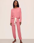 Model is wearing Gisele TENCEL™ Modal Slouchy PJ Set in  Sunkissed Coral/Ivory