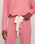 Model is wearing Gisele TENCEL™ Modal Slouchy PJ Set in  Sunkissed Coral/Ivory