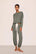 Model is wearing Gisele TENCEL™ Modal Slouchy PJ Set  in Smokey Olive/Ivory