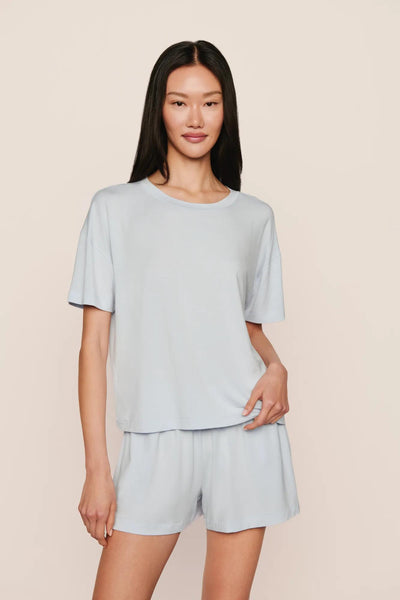 Model is wearing Gisele TENCEL™ Modal Everyday Relaxed Short in Ice Blue