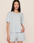 Model is wearing Gisele TENCEL™ Modal Everyday Relaxed Short in Ice Blue