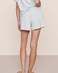 Model is wearing Gisele TENCEL™ Modal Everyday Relaxed Short in Ice Blue