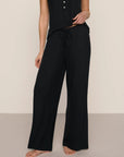 Model is wearing Dream Rib Wide Leg Pant in Black