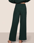 Model is wearing Recycled Boucle Pant in Pine