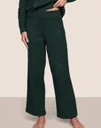 Model is wearing Recycled Boucle Pant in Pine