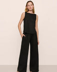 Model is wearing Organic Linen Knit High Waisted Pant in Black