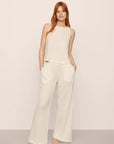 Model is wearing Organic Linen Knit High Waisted Pant in Ivory
