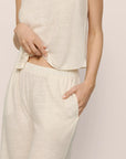 Model is wearing Organic Linen Knit High Waisted Pant in Ivory