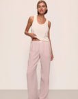 Model is wearing Nautico Boxer Pant in  Feeder Stripespale Mauve/White