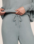 Model is wearing Cozy Time Pant in Lead