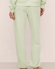 Model is wearing French Terry Jogger in Matcha