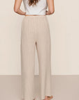 Model is wearing Linen Blend Relaxed Pant in Gingham White/Warm Taupe